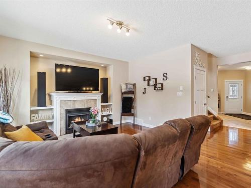 16724 60 Street, Edmonton, AB - Indoor Photo Showing Living Room With Fireplace