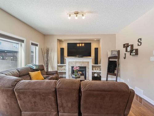 16724 60 Street, Edmonton, AB - Indoor Photo Showing Living Room With Fireplace