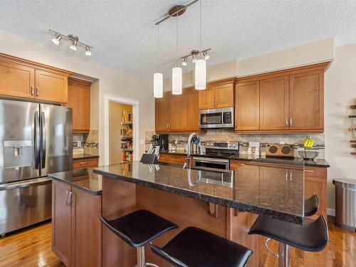 16724 60 Street, Edmonton, AB - Indoor Photo Showing Kitchen With Double Sink