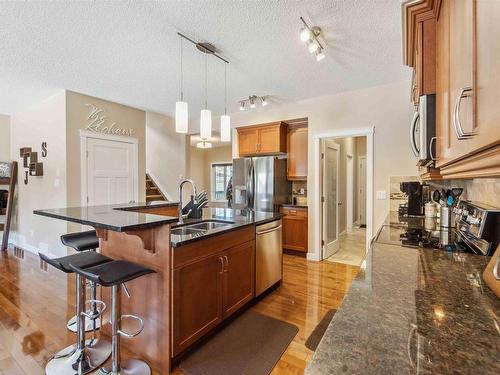 16724 60 Street, Edmonton, AB - Indoor Photo Showing Kitchen With Double Sink