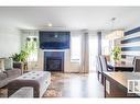 937 Ebbers Crescent Nw, Edmonton, AB  - Indoor Photo Showing Living Room With Fireplace 