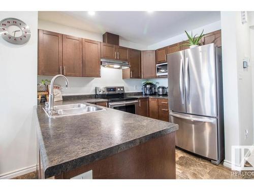 937 Ebbers Crescent Nw, Edmonton, AB - Indoor Photo Showing Kitchen With Stainless Steel Kitchen With Double Sink