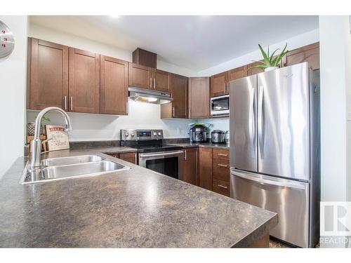 937 Ebbers Crescent Nw, Edmonton, AB - Indoor Photo Showing Kitchen With Stainless Steel Kitchen With Double Sink