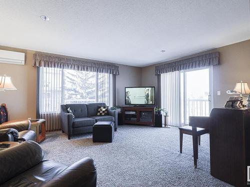 311 10915 21 Avenue, Edmonton, AB - Indoor Photo Showing Living Room