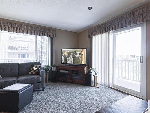 311 10915 21 Avenue, Edmonton, AB - Indoor Photo Showing Living Room