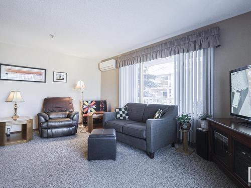 311 10915 21 Avenue, Edmonton, AB - Indoor Photo Showing Living Room