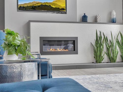 3163 Cameron Heights Way, Edmonton, AB - Indoor Photo Showing Living Room With Fireplace