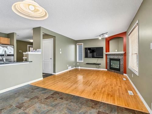 711 89 Street Sw, Edmonton, AB - Indoor With Fireplace