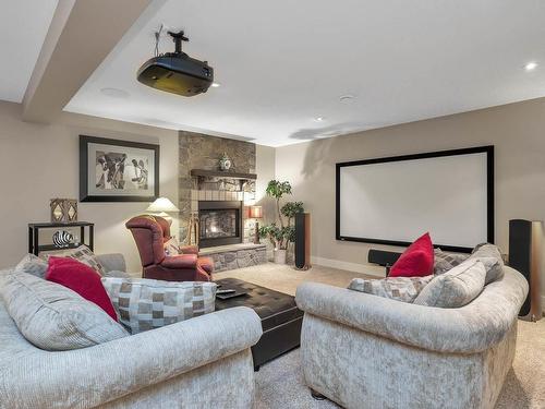 1237 Chahley Landing, Edmonton, AB - Indoor Photo Showing Living Room With Fireplace