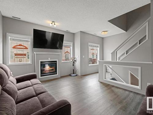 89 13825 155 Avenue, Edmonton, AB - Indoor Photo Showing Living Room With Fireplace