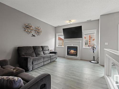 89 13825 155 Avenue, Edmonton, AB - Indoor Photo Showing Living Room With Fireplace