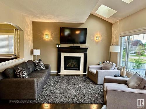 8532 16A Avenue, Edmonton, AB - Indoor Photo Showing Living Room With Fireplace