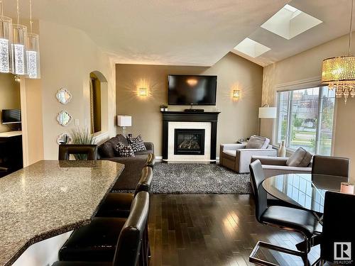 8532 16A Avenue, Edmonton, AB - Indoor Photo Showing Living Room With Fireplace