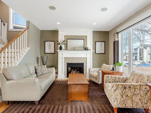 10134 81 Street, Edmonton, AB - Indoor Photo Showing Living Room With Fireplace