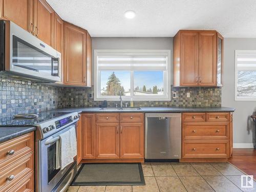 7032 138 Avenue, Edmonton, AB - Indoor Photo Showing Kitchen With Stainless Steel Kitchen