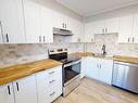 13 9619 180 Street, Edmonton, AB  - Indoor Photo Showing Kitchen With Double Sink With Upgraded Kitchen 