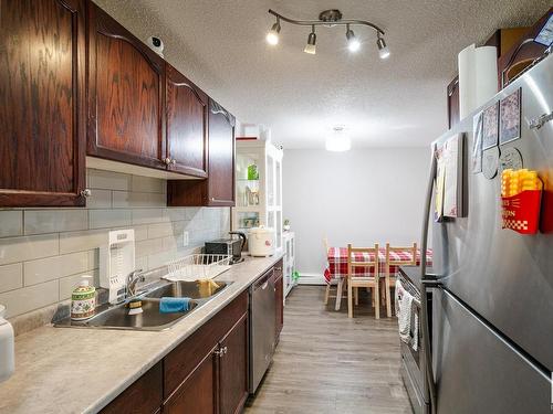 204 10615 110 Street, Edmonton, AB - Indoor Photo Showing Kitchen With Double Sink