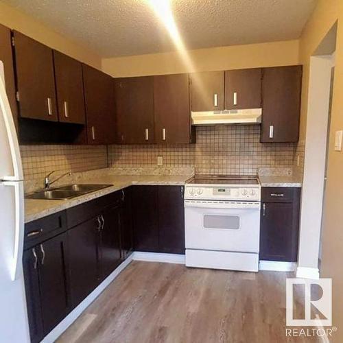 5014 52 Avenue, Glendon, AB - Indoor Photo Showing Kitchen With Double Sink