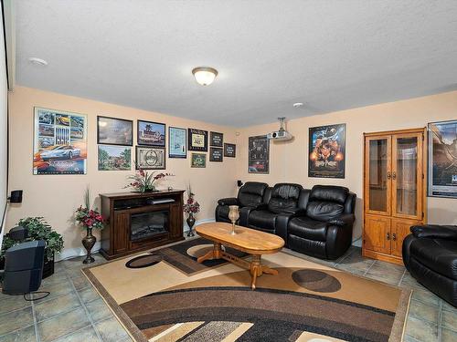 356 Calderon Crescent, Edmonton, AB - Indoor Photo Showing Living Room With Fireplace