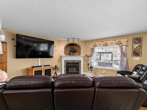 356 Calderon Crescent, Edmonton, AB - Indoor Photo Showing Living Room With Fireplace