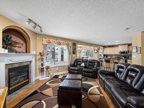 356 Calderon Crescent, Edmonton, AB - Indoor Photo Showing Living Room With Fireplace