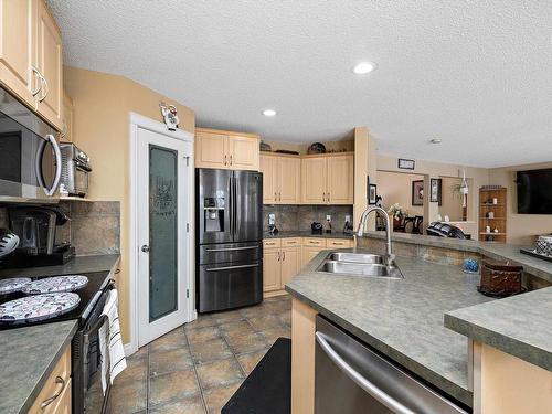 356 Calderon Crescent, Edmonton, AB - Indoor Photo Showing Kitchen With Stainless Steel Kitchen With Double Sink