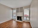 1113 62 Street, Edmonton, AB  - Indoor Photo Showing Living Room With Fireplace 