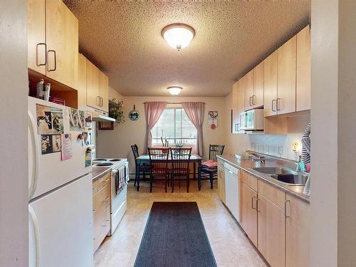 3648 117 Ave, Edmonton, AB - Indoor Photo Showing Kitchen With Double Sink