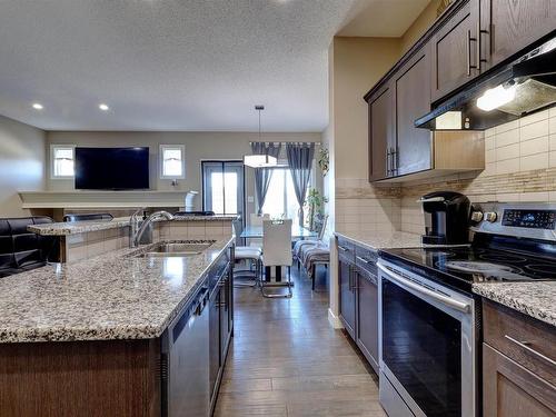 17095 38 Street, Edmonton, AB - Indoor Photo Showing Kitchen With Stainless Steel Kitchen With Double Sink With Upgraded Kitchen