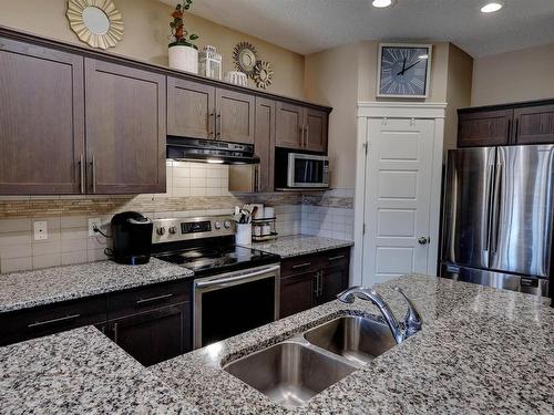 17095 38 Street, Edmonton, AB - Indoor Photo Showing Kitchen With Stainless Steel Kitchen With Double Sink With Upgraded Kitchen