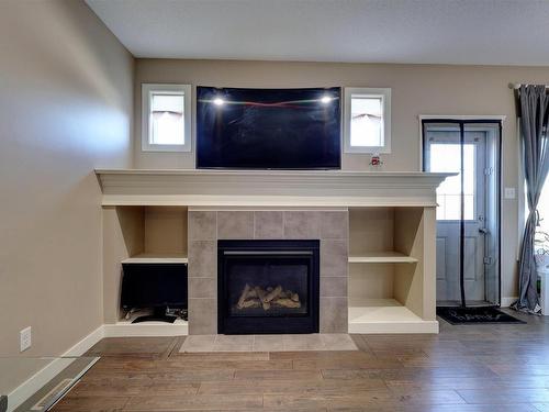 17095 38 Street, Edmonton, AB - Indoor Photo Showing Living Room With Fireplace