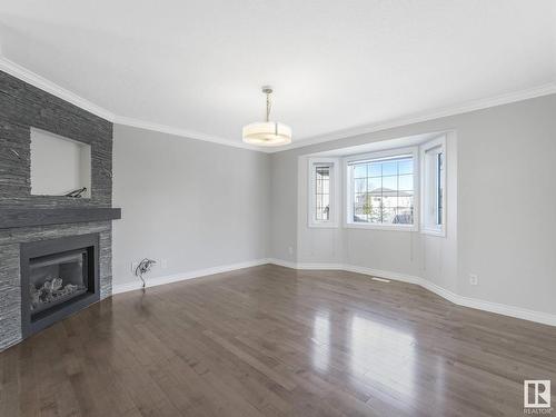 1 17839 99 Street, Edmonton, AB - Indoor Photo Showing Living Room With Fireplace