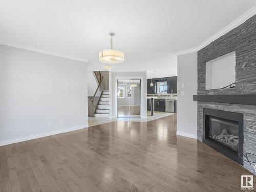 1 17839 99 Street, Edmonton, AB - Indoor Photo Showing Living Room With Fireplace