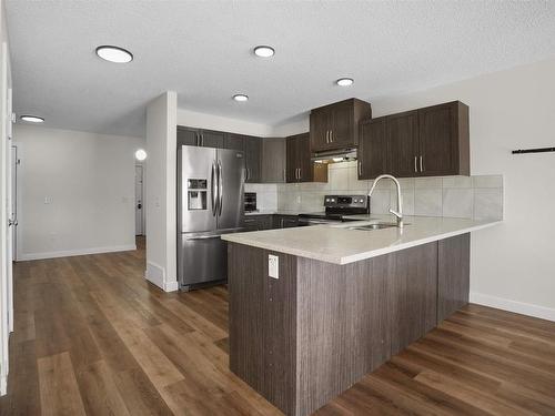 3315 11 Avenue, Edmonton, AB - Indoor Photo Showing Kitchen With Double Sink With Upgraded Kitchen