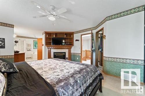 11415 9 Avenue, Edmonton, AB - Indoor Photo Showing Bedroom With Fireplace