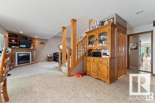 11415 9 Avenue, Edmonton, AB - Indoor Photo Showing Other Room With Fireplace