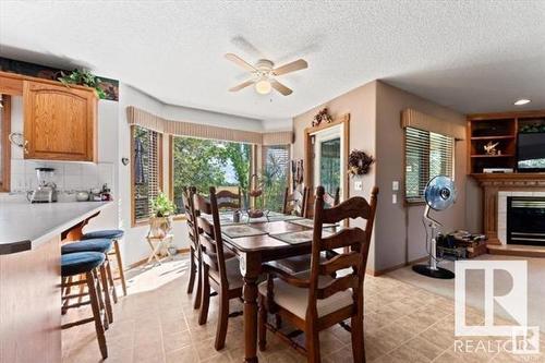 11415 9 Avenue, Edmonton, AB - Indoor Photo Showing Dining Room With Fireplace