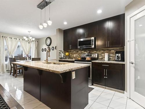 15104 31 Street Nw, Edmonton, AB - Indoor Photo Showing Kitchen With Upgraded Kitchen