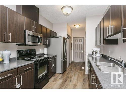 21 735 85 Street, Edmonton, AB - Indoor Photo Showing Kitchen With Double Sink