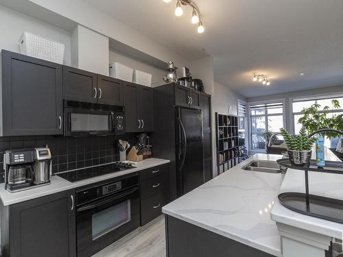 314 9804 101 Street Nw, Edmonton, AB - Indoor Photo Showing Kitchen With Double Sink With Upgraded Kitchen