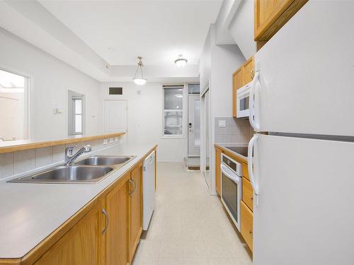 129 10407 122 Street, Edmonton, AB - Indoor Photo Showing Kitchen With Double Sink