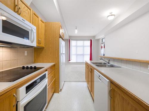 129 10407 122 Street, Edmonton, AB - Indoor Photo Showing Kitchen With Double Sink