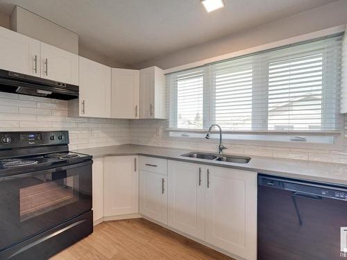 7408 149A Avenue, Edmonton, AB - Indoor Photo Showing Kitchen With Double Sink