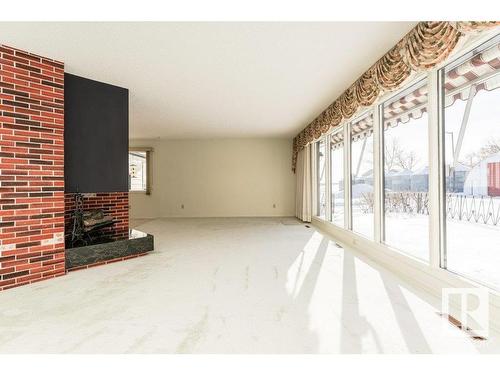 2805 259 Avenue, Edmonton, AB - Indoor Photo Showing Other Room With Fireplace