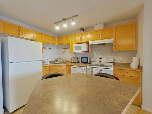 335 3425 19 Street, Edmonton, AB - Indoor Photo Showing Kitchen With Double Sink