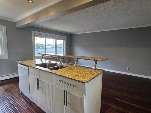 34 10525 83 Avenue, Edmonton, AB - Indoor Photo Showing Kitchen With Double Sink