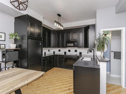 402 10728 82 Avenue, Edmonton, AB - Indoor Photo Showing Kitchen With Double Sink