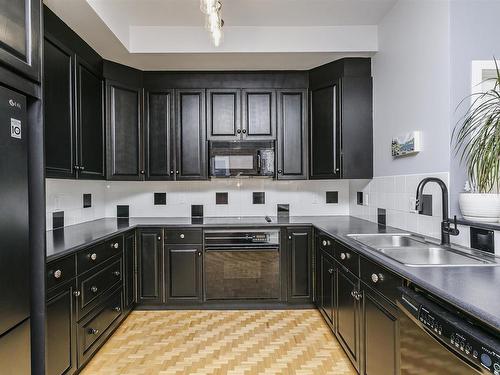 402 10728 82 Avenue, Edmonton, AB - Indoor Photo Showing Kitchen With Double Sink