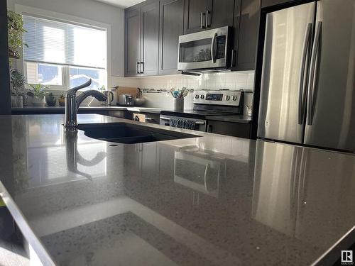 175 Hawks Ridge Boulevard Nw, Edmonton, AB - Indoor Photo Showing Kitchen With Stainless Steel Kitchen With Double Sink With Upgraded Kitchen