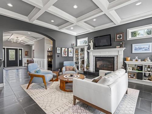 60 Windermere Drive, Edmonton, AB - Indoor Photo Showing Living Room With Fireplace